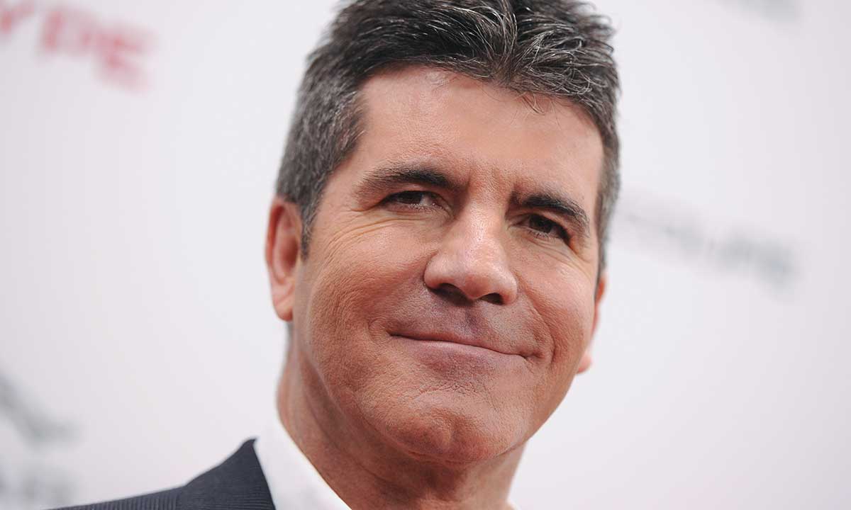 Simon Cowell recovering from back surgery after bike fall